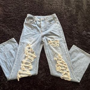 These are a pair of size XXS ripped jeans from shein.